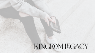 A person's hands holding a bible over their knees. The text reads 'Kingdom Legacy'.