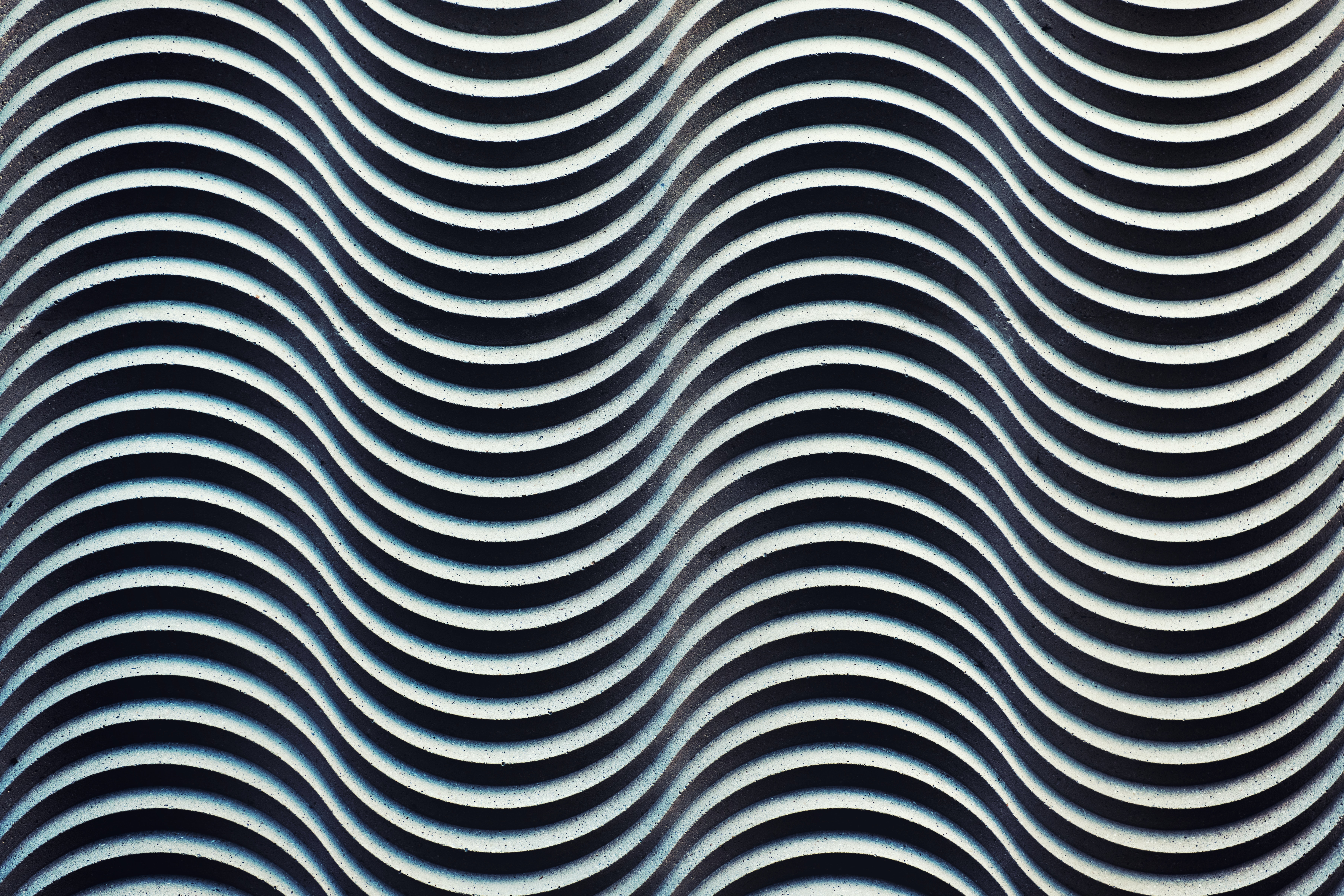 A black and white image of wavy lines close together