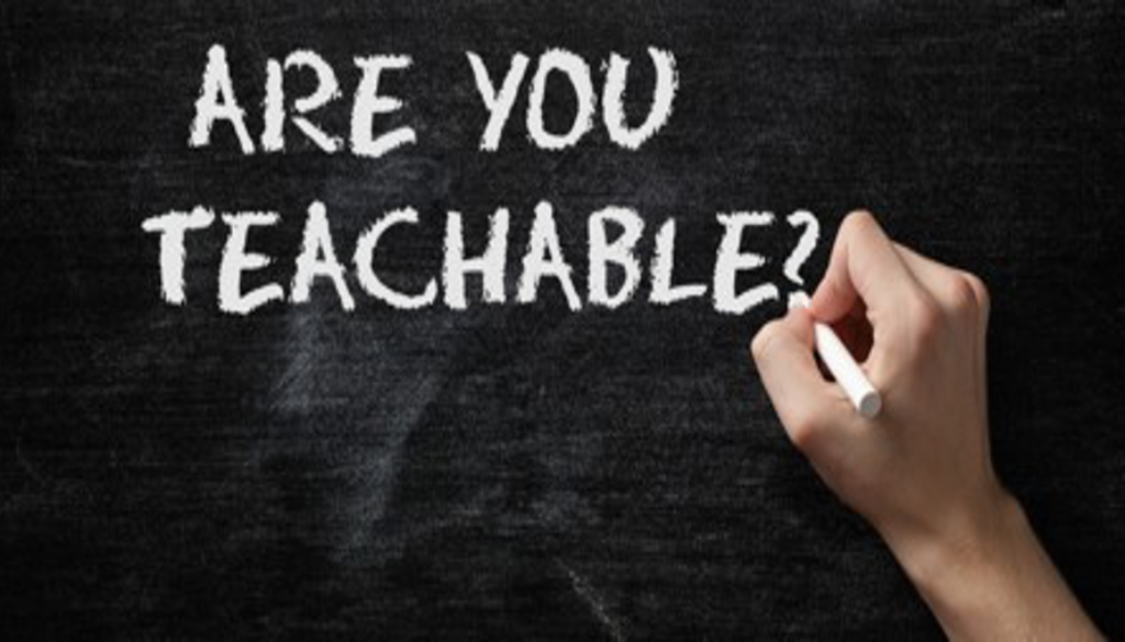 'Are you teachable' written on a chalk board