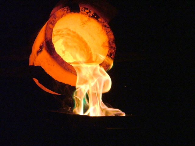A furnace pouring liquid gold